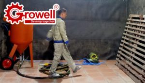 Buồng phun cát và máy phun cát di động: So sánh chi tiết