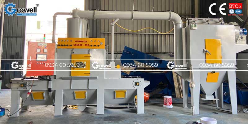 Máy phun cát băng tải lưới